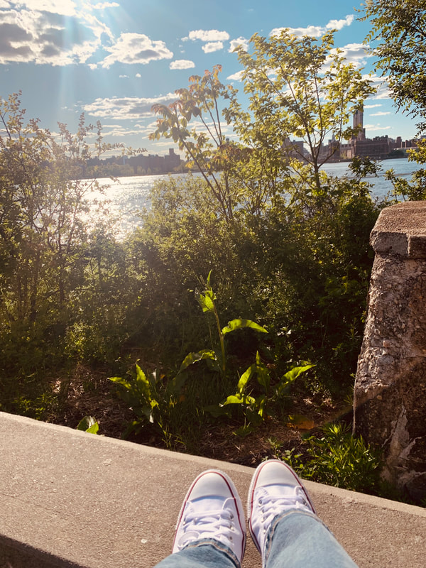 Converse overlooking the water in Brooklyn